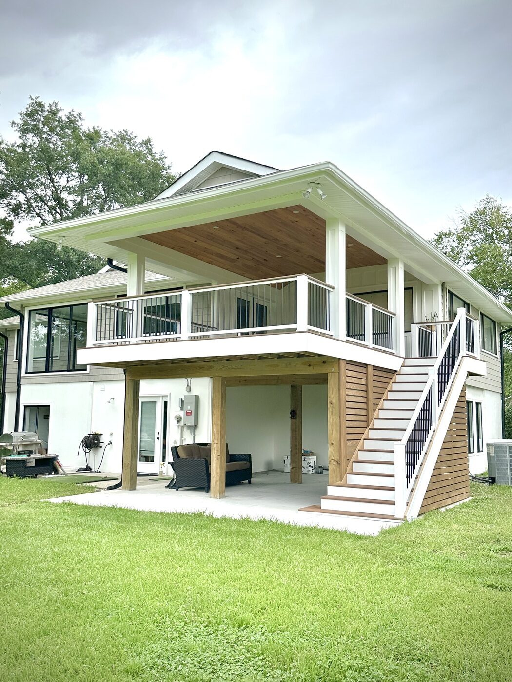 Two-level covered porch with exterior stairs
